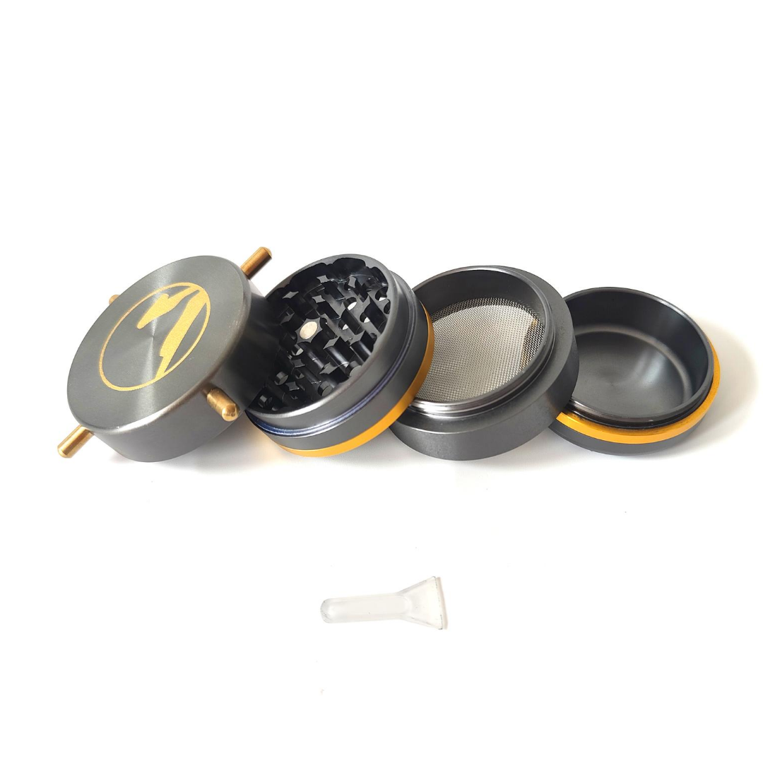 Disassembled Twisty Herb Grinder Showing Grinding Teeth, Mesh Screen, Collection Chamber and Removable Lid