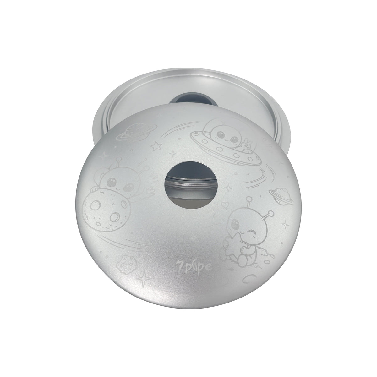 Angled View of the 7pipe SUKA Orbit Alien Edition Showing Its Round Silver Metal Body and Central Opening